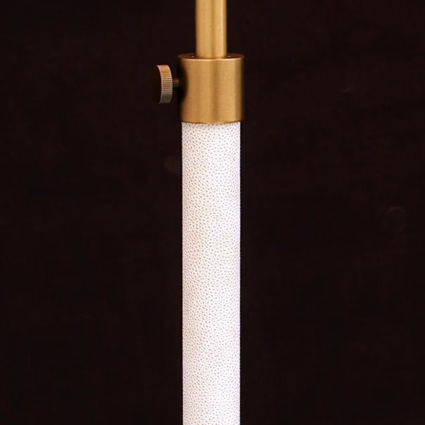 Floor lamp with textured stand