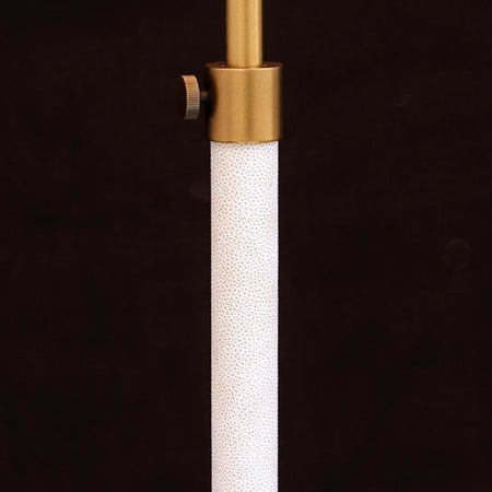 Floor lamp with textured stand