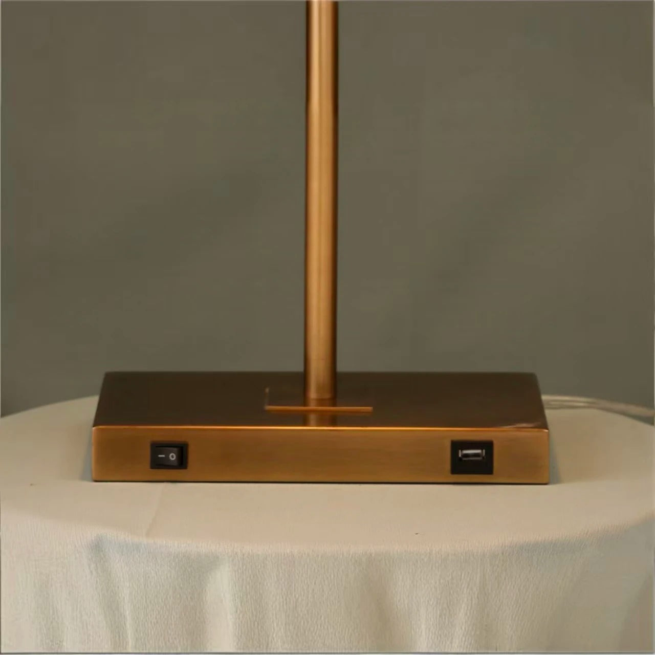 Table lamp with curved arm