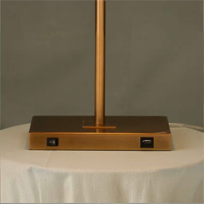 Table lamp with curved arm