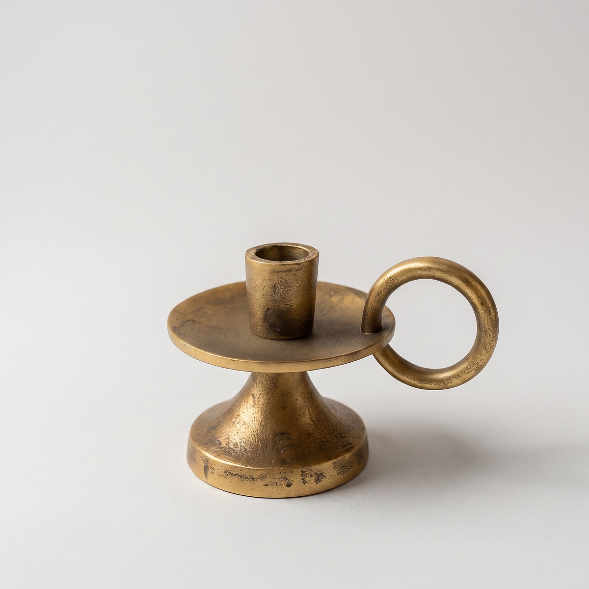 Taper candle holder antique brass packshot